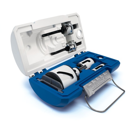 A Lenox blue and white hard plastic carrying case with metal handle, containing a set of hole saws and accessories for drilling. The case is opened, revealing the organized placement of various saw blades and arbors inside.