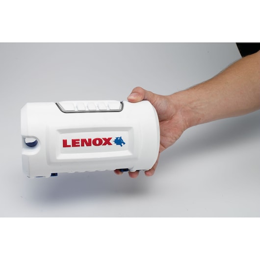 Photo of LENOX 1815140 white tool case held in hand, LENOX logo visible, studio angle.