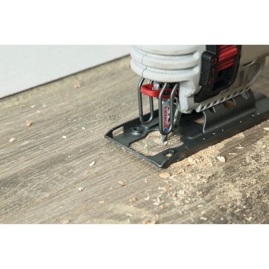 LENOX 1991408 jigsaw blade cutting wood, close-up showing sawdust and tool blade.