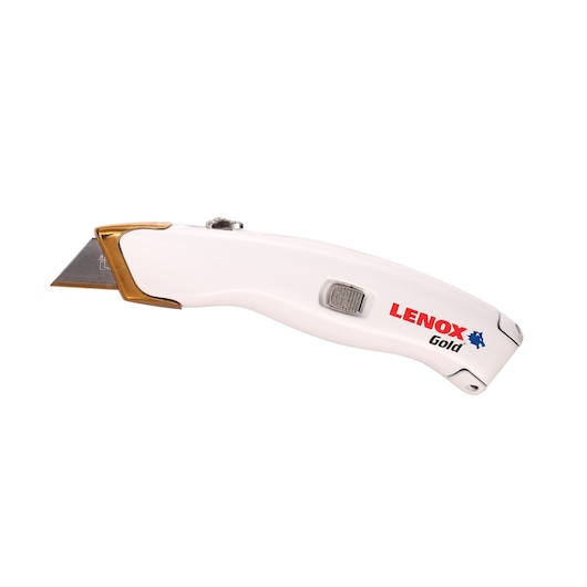 LENOX 20353SSRK1 utility knife with white handle, gold accents, and exposed blade, side angle.