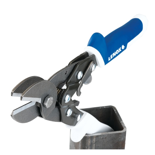 Photo of LENOX 22208C3 aviation snips with blue and white handle cutting metal tube, side angle.