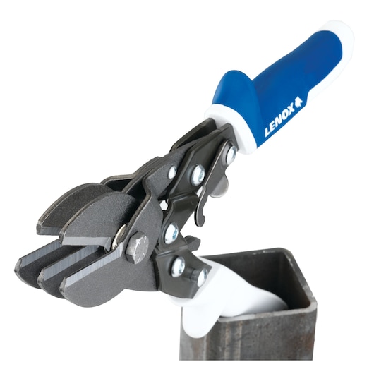 LENOX 22209C5 aviation snips with blue handle cutting metal pipe, side view on white background.