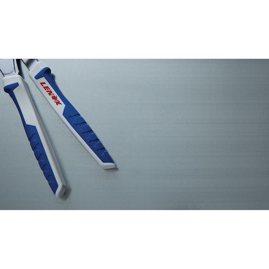 Photo of LENOX LXHT90552 pliers with blue and white ergonomic handles, partial close-up view.
